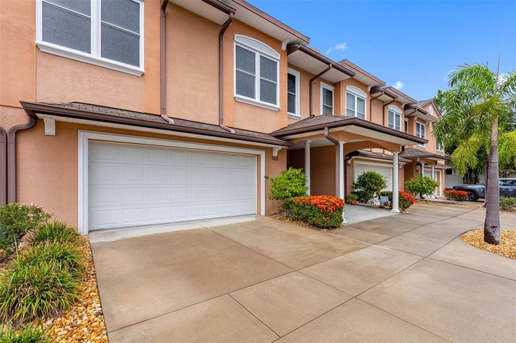 Photo of 763 Date Palm Lane, St Petersburg, FL 33707 (MLS # TB8421610)