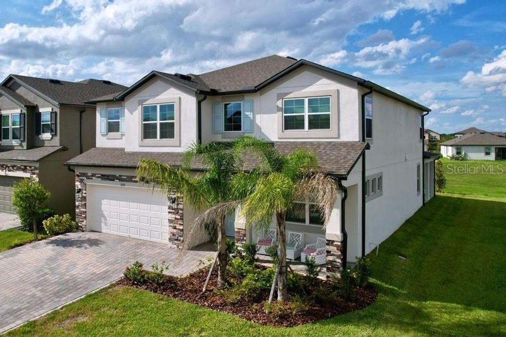 Photo of 2450 Sunny Pebble Loop, Zephyrhills, FL 33540 (MLS # TB8429840)