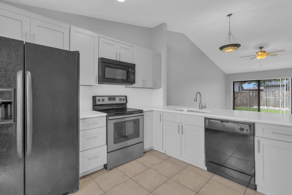 Photo of 907 Park Villa Circle, Orlando, FL 32824 (MLS # S5156915)