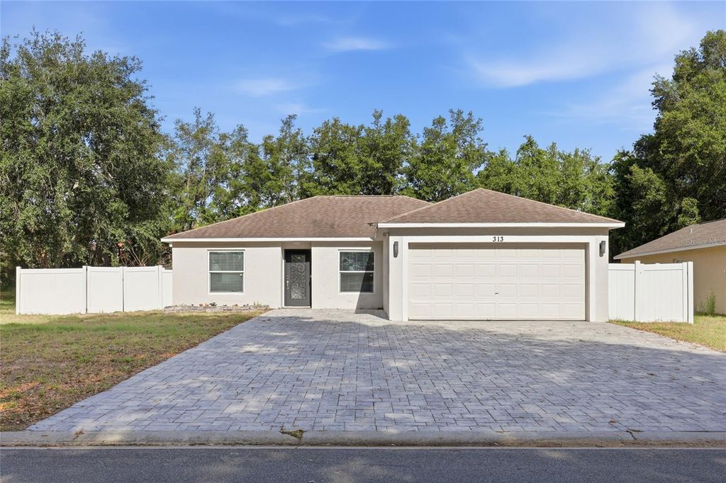 Photo of 313 Foggy Creek Road, Davenport, FL 33837 (MLS # TB8511704)