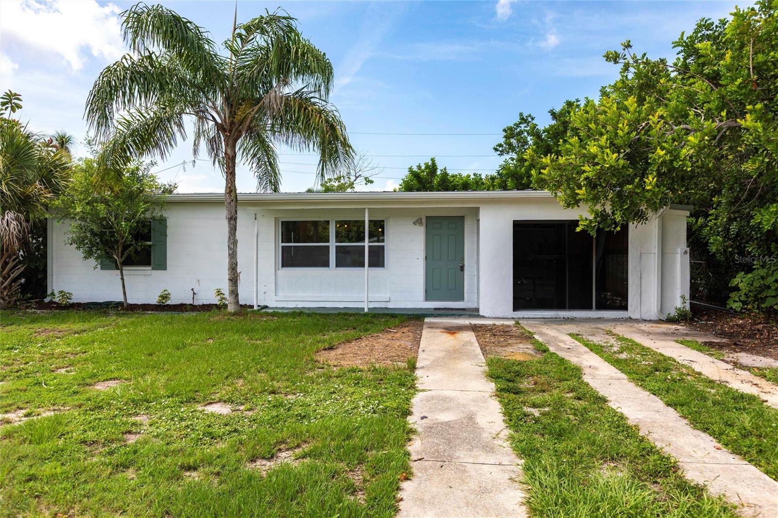 Don't miss this beautifully updated home offering a bright, open layout and a host of upgrades! The living room features a vaulted ceiling that enhances the spacious feel, while the updated kitchen shines with wood cabinets, granite tile countertops, and modern appliances. Home features city water and sewer and very private rear yard.
Enjoy peace of mind with impact windows throughout (slider protected by shutters), updated 200-amp electrical service, and a new metal roof installed in 2023. Per Charlotte County permit records, the A/C system was replaced in 2017.
Interior highlights include:
Ceramic tile and luxury vinyl flooring throughout
Bright, cheerful kitchen with upgraded finishes
Indoor laundry hookups (closet access)
Screened back lanai and open front porch for relaxing outdoors
Partially fenced yard for added privacy
Enclosed carport can easily be converted to an attached garage.
This home is connected to public water and sewer, and is ideally located near a newer home to the left. Just a short drive to Port Charlotte Beach Park and the shops, dining, and charm of downtown Punta Gorda.
Move-in ready and full of character—schedule your showing today!