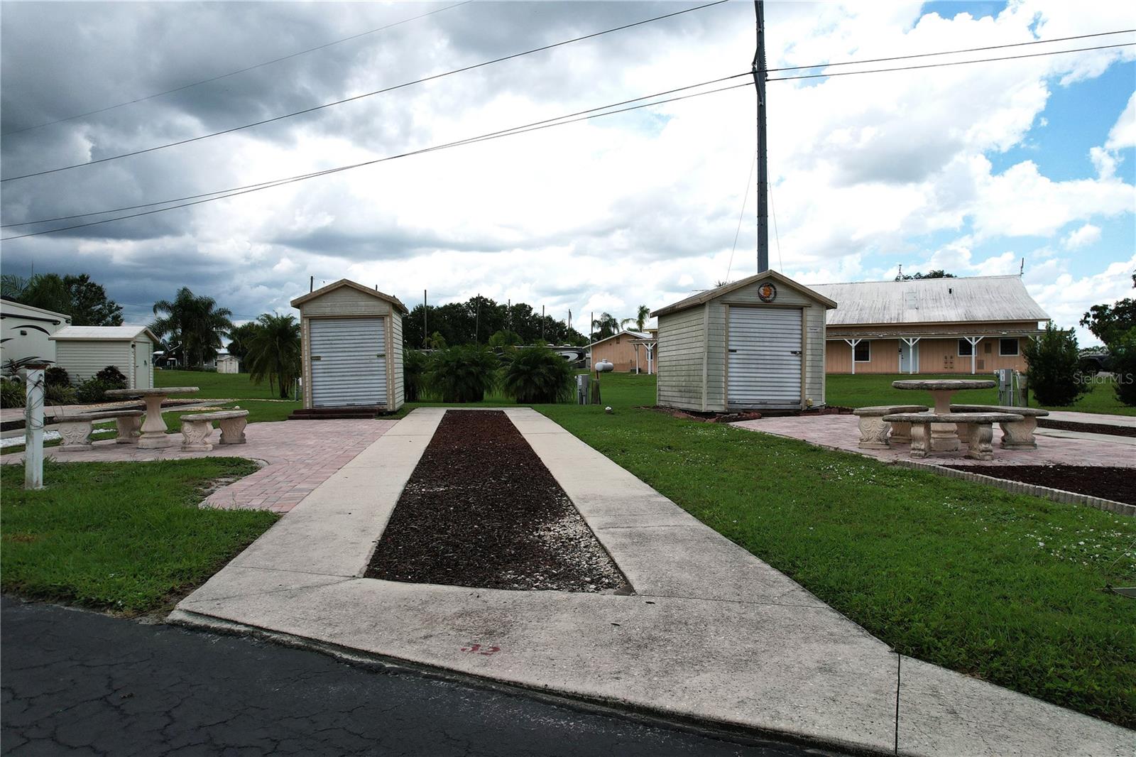 Looking for a slice of paradise in Sunny Florida? Welcome to Torrey Oaks RV Resort in Bowling Green, Florida! This 55+ FUN ACTIVE COMMUNITY is the place to live year around or the perfect spot for your new winter GETAWAY! This Deeded RV lot boasts a paver stone patio adjacent to the RV concrete pad with a patio set! 6x8 Storage Shed is also included to store all your Florida toys! Located in the back of the park with lots of green space in one of Florida’s TOP Resorts! This luxury lot in the Class A and Fifth Wheel only park! The location is perfect, secluded yet just a short drive to great shopping, restaurants and all the popular central Florida attractions that family and friends love! Just 68 miles to beautiful St. Petersburg beach and just 8 miles to Hardee County Lakes with 400 acres of walking trails and 5 lakes for fishing and boating. Enjoy visiting friends on your golf cart or golfing at the near by 9-hole golf course! Torrey Oaks RV Resort features a heated pool, shuffleboard courts, pickle ball courts, fitness center, game room with bingo and billiards, library, and recreation hall with full sized kitchen and two laundromats! During the snowbird months there is an on-site chef to prepare all your favorite meals! Pets are welcome and have their own fenced in dog park. The taxes are $530 a year and the HOA fee is ONLY $130 monthly. Water, sewer, trash pickup, mowing and use of the buildings and amenities are included. There is an annual fee of $45 for city water and sewer and you pay for the electricity. Total cost a year is $1,605. Wi-Fi is not supplied but available. Torrey Oaks Resort is the perfect place to enjoy RV Resort Style living at its best!