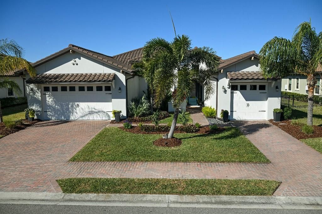 Photo of 513 17th Avenue E, Palmetto, FL 34221 (MLS # TB8475924)