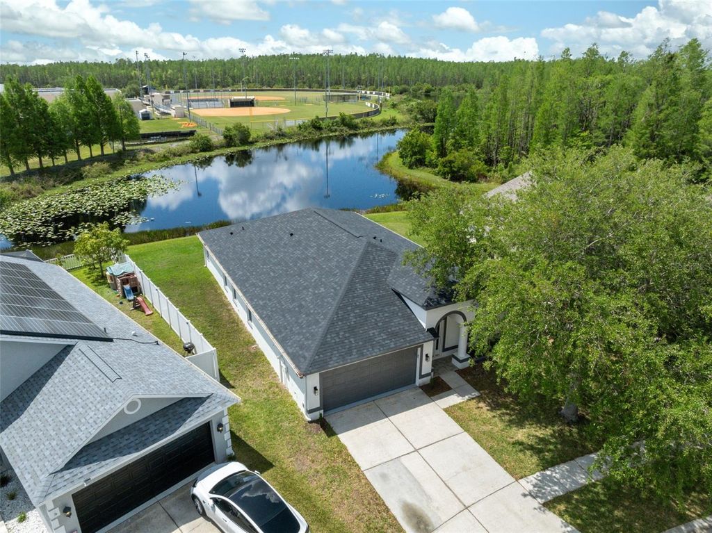 Photo of 18456 Merseyside Loop, Land O Lakes, FL 34638 (MLS # W7874422)