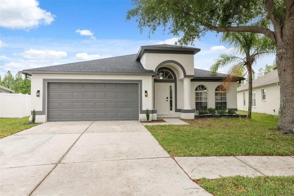 Photo of 18456 Merseyside Loop, Land O Lakes, FL 34638 (MLS # W7874422)