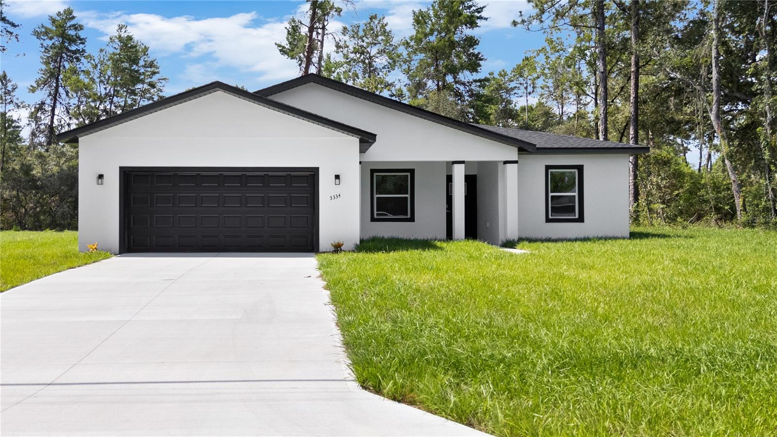 Now Available in Ocala!
This beautifully designed 4-bedroom, 3-bath home with an additional Den/Office offers modern living at its finest. The open-concept layout is highlighted by soaring 9-ft ceilings, recessed lighting, and stylish laminate flooring throughout the main areas. The kitchen is a true showpiece, featuring a sleek waterfall island with pendant lighting, soft-close cabinetry, Whirlpool stainless steel appliances, and a dedicated coffee bar for your morning routine. The primary suite is a private retreat with a spa-inspired bathroom complete with a walk-in shower, soaking tub, and spacious walk-in closet. Other features include a linen closet, inviting front porch, and a covered back porch perfect for relaxing or entertaining. Don't miss out, schedule your private tour today!