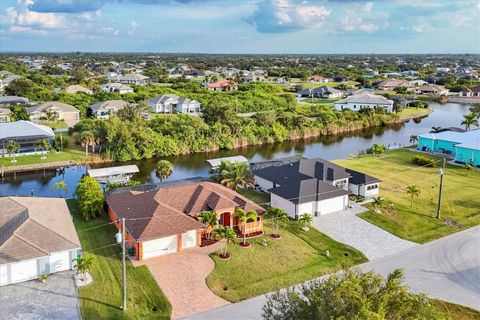 Photo of 9244 Hialeah Terrace, Port Charlotte, FL 33981 (MLS # D6144912)