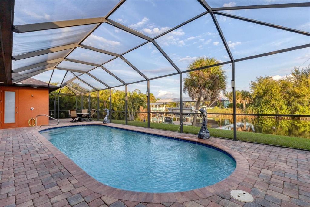 Photo of 9244 Hialeah Terrace, Port Charlotte, FL 33981 (MLS # D6144912)