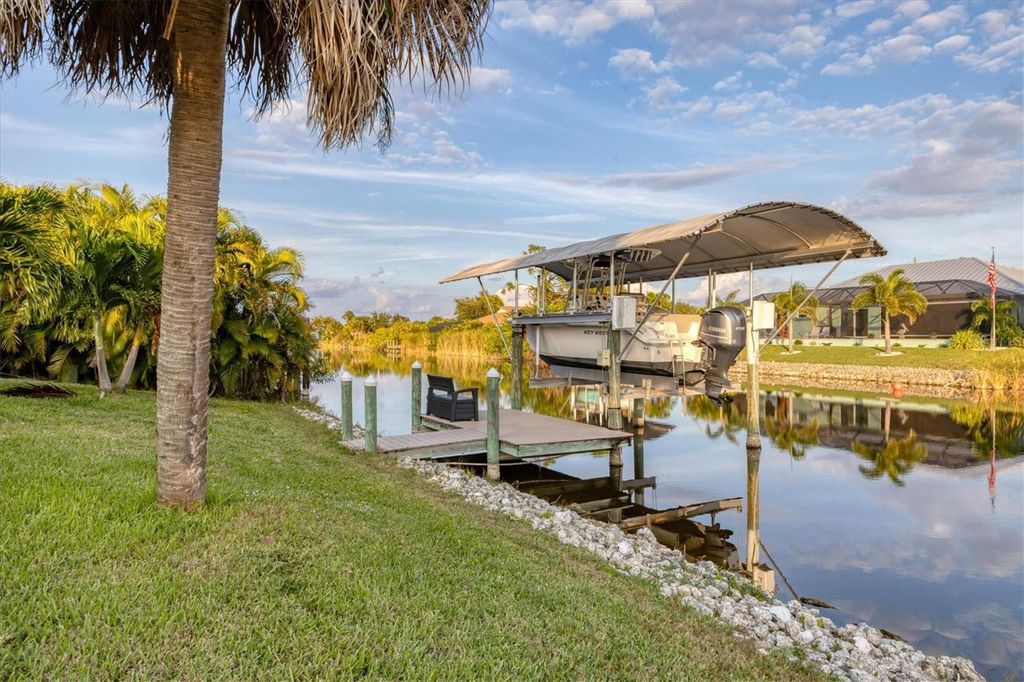 Photo of 9244 Hialeah Terrace, Port Charlotte, FL 33981 (MLS # D6144912)