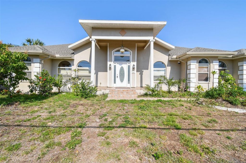 Photo of 284 Peninsula Avenue, Tarpon Springs, FL 34689 (MLS # TB8375093)