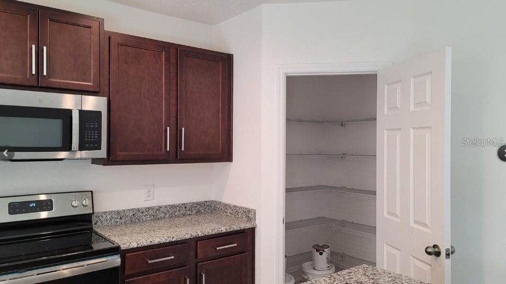 Photo of 1079 Chase Austin Way, Sanford, FL 32771 (MLS # O6401216)