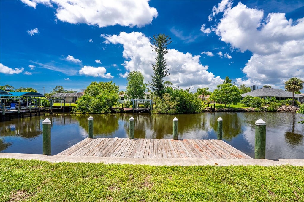 Photo of 5097 Ackley Terrace, Port Charlotte, FL 33981 (MLS # D6148195)
