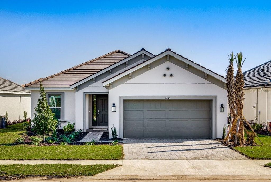Photo of 4658 Freccia Loop, Wesley Chapel, FL 33543 (MLS # TB8313560)