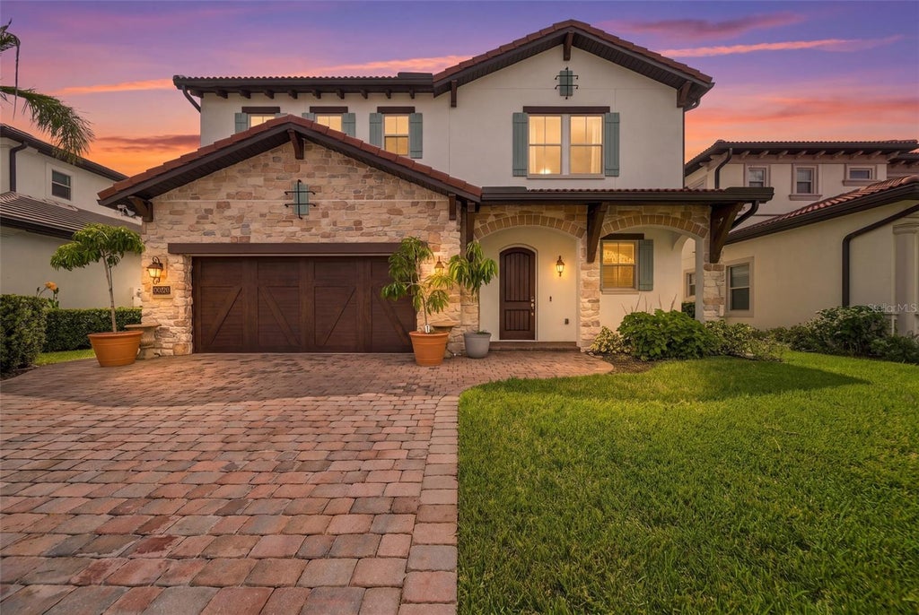 Photo of 10397 Royal Cypress Way, Orlando, FL 32836 (MLS # O6443775)