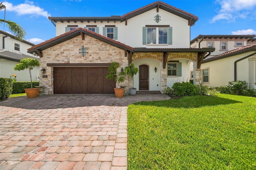 Photo of 10397 Royal Cypress Way, Orlando, FL 32836 (MLS # O6443775)