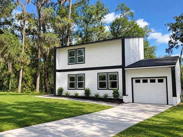 Photo of 1521 NW 35 Terrace, Gainesville, FL 32605 (MLS # GC543665)