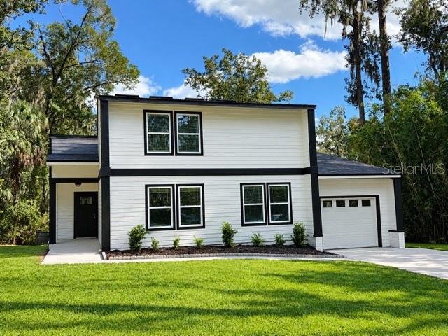 Photo of 1521 NW 35 Terrace, Gainesville, FL 32605 (MLS # GC543665)