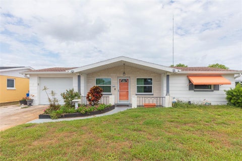 Photo of 1447 Weyford Lane, Holiday, FL 34691 (MLS # TB8541448)