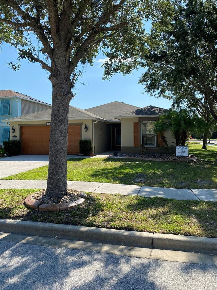 This 4 bedroom corner lot and all updated home can be yours to enjoy and is located in the very popular beach city of New Smyrna.  Conveniently located to I-95 access and near shopping and schools - you never have to drive far.  Some of the many amenities include the following:  Screened in patio,  Ceramic (wood-look) tile in living area and kitchen and baths, stove and refrigerator 2022, exterior paint 2022, Roof Maxx Treatment 2023, roll down hurricane shutters, gutters, glass insert for front door, new granite countertop, sink and garbage disposal, new backsplash, Generac hook-up for generator, upgraded irrigation system (2023), A/C 2021, hot water tank 2020.  Also included washer and dryer, garage refrigerator, dining area hutch and credenza (matching wood kitchen cabinets).  All information contained herein to be verified by buyer.  Room Sizes are approximate. ;Water: City