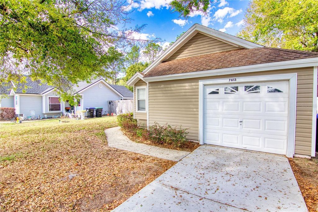 Photo of 7613 Pacific Heights Circle, Orlando, FL 32835 (MLS # O6390898)