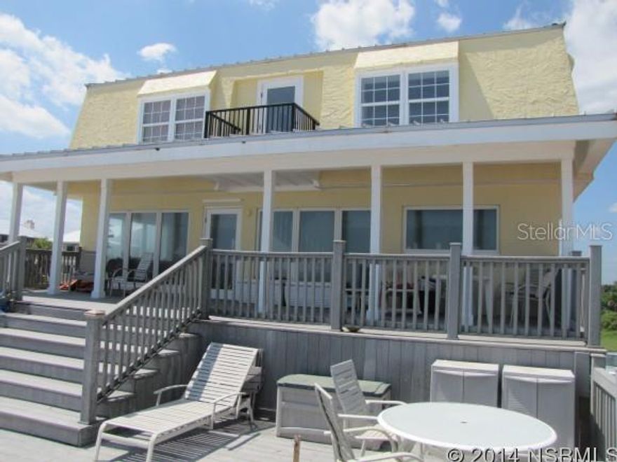 Lots of room in this spacious oceanfront home. Located on the no drive beach area. Large deck overlooking the ocean. In 2013 the home was remodeled with new  tile and wood flooring along new kitchen with stainless steel appliances, granite countertops and beautiful new cabinets. The living room/dining room/kitchen faces the ocean while on the west side of the living area you have a family room. One car garage. Close to Canaveral Seashore. Walk to the river for fishing, boating, paddle boarding, kayaking or just enjoying the beautiful Indian River Lagoon. Best of both worlds in the lovely beach home. One car garage. ;Water: City
