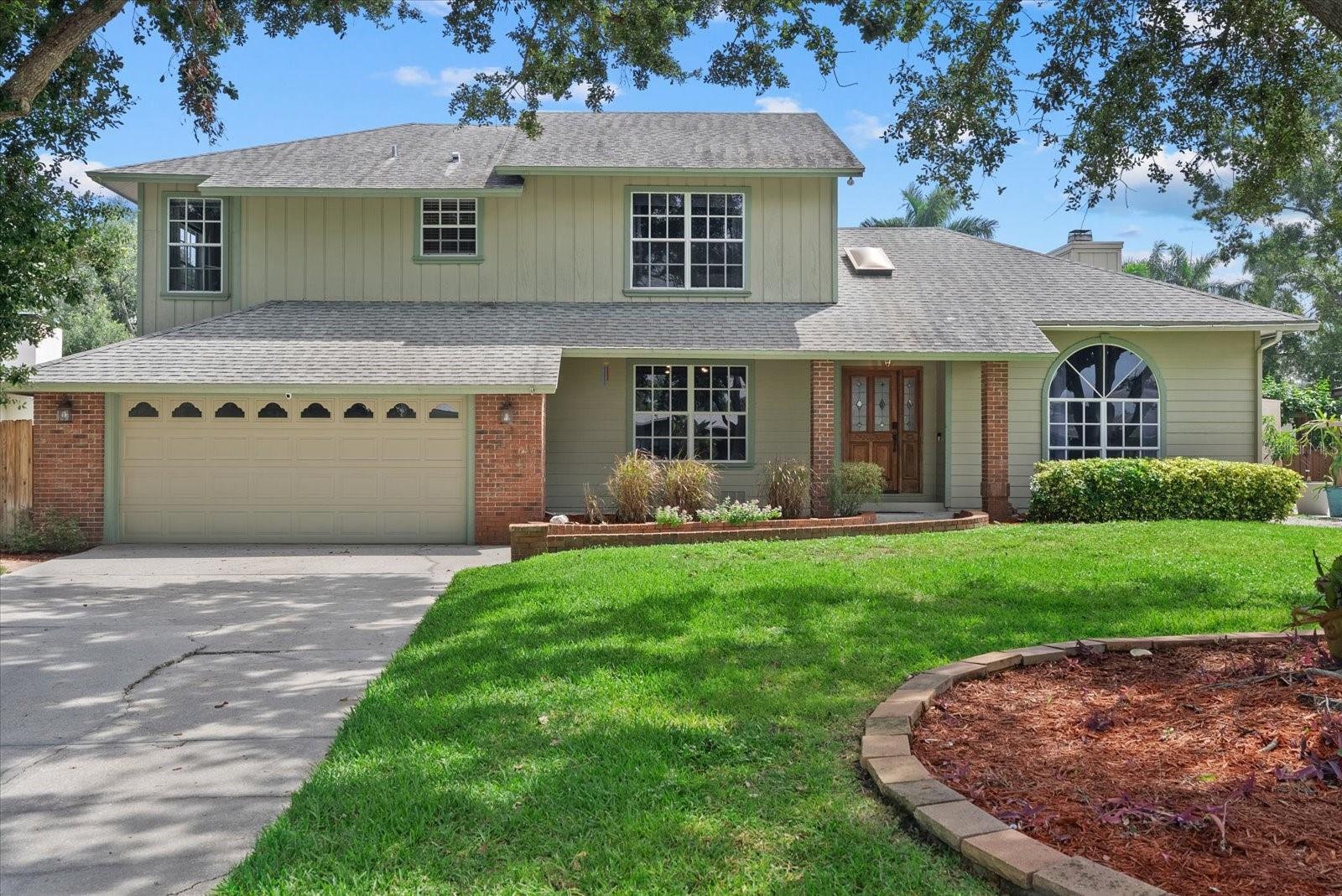 Welcome to your Northwest Bradenton retreat—less than 15 minutes to numerous award-winning beaches! This spacious 5 bedroom plus den, 3 bathroom pool home offers nearly 3,000 sq. ft. of versatile living space designed for families, entertaining, or investment. Currently operating as a high-performing short-term rental, the property has the ability to generate over $100,000 annually, making it a rare find for those seeking both lifestyle and income. Step inside and you’ll find a beautifully refreshed interior that was thoughtfully updated in 2022. Luxury vinyl plank flooring runs throughout the home, complemented by fresh Sherwin Williams paint, modern designer lighting, and updated ceiling fans. The kitchen features new fixtures and opens seamlessly to the living area, where a wood-burning fireplace, built-in shelving, and oversized windows create a warm and inviting atmosphere. French doors lead to a versatile media room, perfect for cozy movie nights, while an additional office or flex room provides space for work or hobbies. The flexible floor plan also allows for first-floor living with a bedroom, full bath, and laundry area located downstairs—ideal for guests or multigenerational households. Upstairs, the expansive owner’s suite includes a spa-like ensuite bath, dual walk-in closets, and a private office or sitting area with balcony access overlooking the tropical backyard oasis. Additional bedrooms provide plenty of room for family, visitors, or hosting large groups, making this home equally functional as a primary residence or vacation rental. Outdoor living is a true highlight. A newly resurfaced heated pool (2023) serves as the centerpiece of the lush backyard, complemented by a covered patio with ceiling fans and ample space for entertaining. A storage shed provides added convenience, making the outdoor space both functional and enjoyable. Peace of mind comes with a long list of upgrades: new pool heater with wifi-enabled switch (2022), updated electrical panel (2022), Nest thermostat, Kwikset smart key locks, Schlage wifi-enabled electronic locks, MyQ garage controller, Ring floodlights, and a brand-new AC unit installed in 2024. Every detail has been carefully maintained to offer modern comfort and efficiency. Located in the desirable Taliescent neighborhood, this home places you minutes from Robinson Preserve, DeSoto National Park, boat ramps, and the best of Florida’s Gulf Coast. Whether you are searching for a primary residence, a second home, or a proven income-producing investment, this property truly checks every box. Experience the perfect combination of space, style, and location in one of Bradenton’s most sought-after areas.