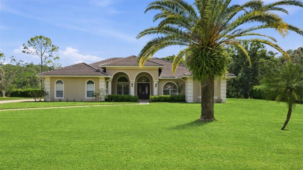 Photo of 18629 Avenue Capri, Lutz, FL 33558 (MLS # TB8496791)