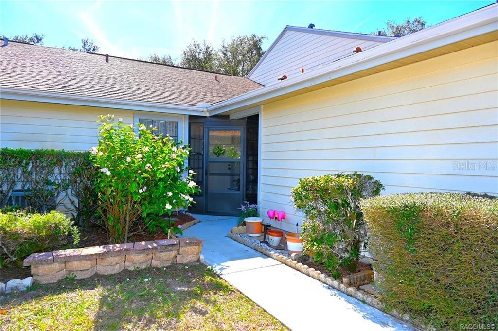 TURN-KEY *** GREAT OPPORTUNITY: PRICE IMPROVEMENT! MOVE-IN-READY, FULLY FURNISHED! Immaculate villa - even comes with dishes and silverware nestled in the desirable Moorings Community. NEW ROOF & ELECTRIC PANEL FEBRUARY, 2025. DISCOVER this charming and affordable home. Bring your jammies and toothbrush, it's ready!! Part-timers or full-timers will enjoy this nature-filled area of the Nature Coast and the Florida life-style. Enclosed FLORIDA ROOM. Kitchen includes dining and inside washer & dryer. LOW HOA FEES INCLUDES CABLE, WIFI, YARD MAINTENANCE, IRRIGATION, TRASH PICKUP, BOAT STORAGE & ACCESS INTO BIG LAKE HENDERSON. CANALS & LAKES FOR BOATING OR KAYAKING. There's a CABANA, SALT-WATER SOLAR-HEATED SWIMMING POOL AND SHUFFLEBOARD. WALK THE WITHLACOOCHEE TRAIL or visit the FARMER'S MARKER AT THE DEPOT. Ride your bike, play golf, or just sit on your patio and enjoy the birds. This is your new nest. You're going to be so excited. Public golf course, with restaurant, across the street. Grocery and downtown about 10 minutes away. It's all so convenient! Note: Owners have removed some items since original pictures.