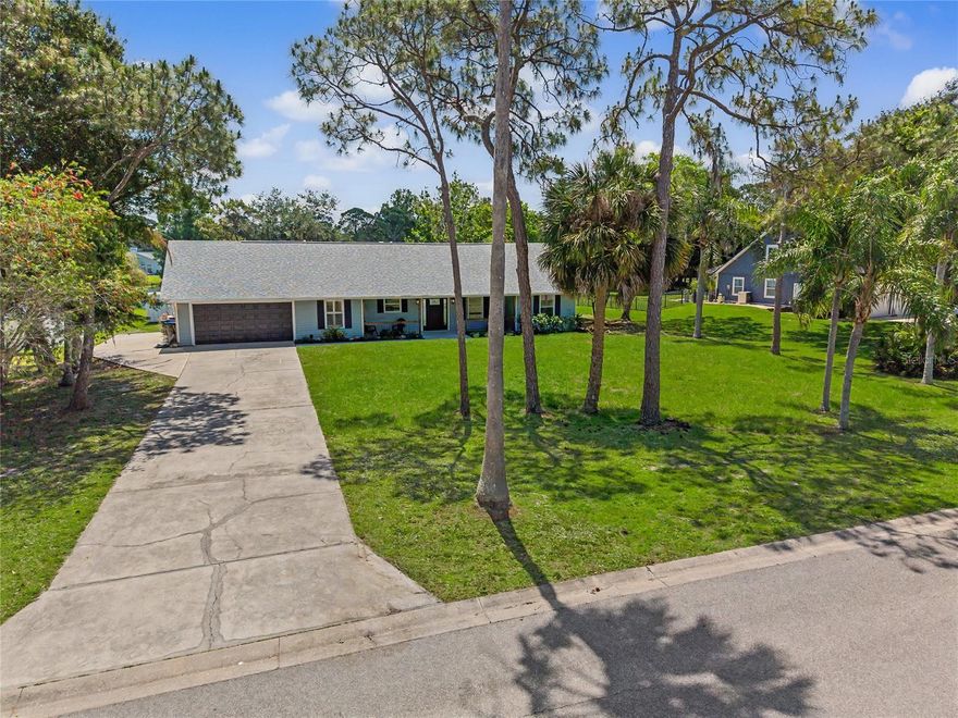 A long private driveway provides ample off-street parking—ideal for entertaining family and guests—while the fresh landscaping creates outstanding curb appeal from the moment you arrive. Step inside this 3 bedroom, 2 bath home to discover a thoughtfully updated interior designed for modern comfort and style. Featuring a brand-new roof, new air-conditioning system, new flooring, fresh interior paint, updated electrical finishes, and a completely new septic system for peace of mind. The stunning new kitchen showcases sleek cabinetry, stainless steel appliances, and an inviting layout perfect for everyday living or entertaining. Both bathrooms have been tastefully renovated with contemporary finishes and fixtures. Additional features include an inside laundry room, attached 2-car garage, and a detached storage shed for added convenience. Outdoors, enjoy your own private oasis with a sparkling pool overlooking a tranquil lake, creating the perfect backdrop for relaxing evenings or weekend gatherings. A lakeside firepit adds warmth and charm, making this property ideal for enjoying Florida’s beautiful outdoor lifestyle year-round. This exceptional property offers the rare combination of modern upgrades, generous land, privacy, and scenic waterfront living—all within one of the area’s most desirable communities.