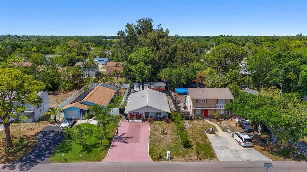 Photo of 831 Winter Garden Drive, Sarasota, FL 34243 (MLS # A4693534)