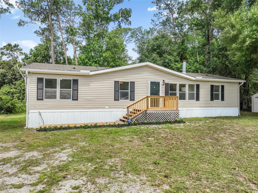 Photo of 2318 Coconut Boulevard, Bunnell, FL 32110 (MLS # FC319711)