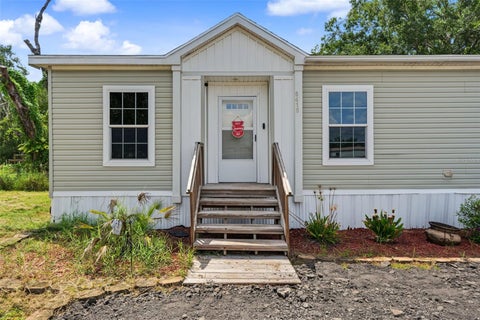 Photo of 6415 Mangrove Drive, Wesley Chapel, FL 33544 (MLS # TB8538794)