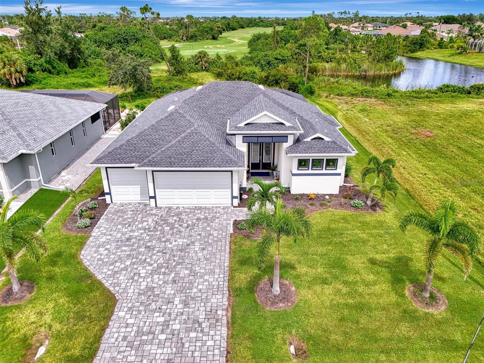 Why build when you can buy this open floor-plan home (FURNISHED with a few exceptions), built in 2022 with 3 BDRM 2 BA (1,877 SF) with a 3-car garage and a heated saltwater lap pool on a very private lot that backs up to the Long Marsh Golf Course! This outstanding home located in an “X” non-flood zone has Hurricane Impact Windows throughout with a whole-house generator prewire installed! As you walk through the front double-screened doors with blinds, you enter the large gathering room that opens to the beautiful chef’s kitchen with large kitchen island and dining room with plenty of room for entertaining your family and friends! The kitchen features a large sink, quartz countertops, under-cabinet lighting, and a large pantry. Right off the 3-car garage, there is a nice-sized laundry room with sink and folding counter. This well-designed home has the split bedroom design with the Master on one side and two bedrooms on the other and includes Plantation Shutters, Solar Shade in the Master Bedroom, His and Her Walk-In Closets, and two linen closets in the Master Bath. As you walk through the sliding doors to the gorgeous outside living space, there is a 12’ x 44’ heated saltwater lap pool along with an outdoor shower and a separate entry to the pool bath for entertaining all your guests! Low HOA fees and no CDD! Come see how you can make this gem your next home in paradise in Rotonda West, FL today!