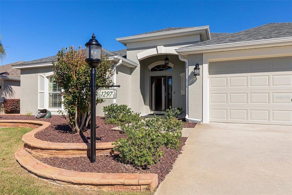 Photo of 1297 Zombar Pl, The Villages, FL 32163 (MLS # O6450552)