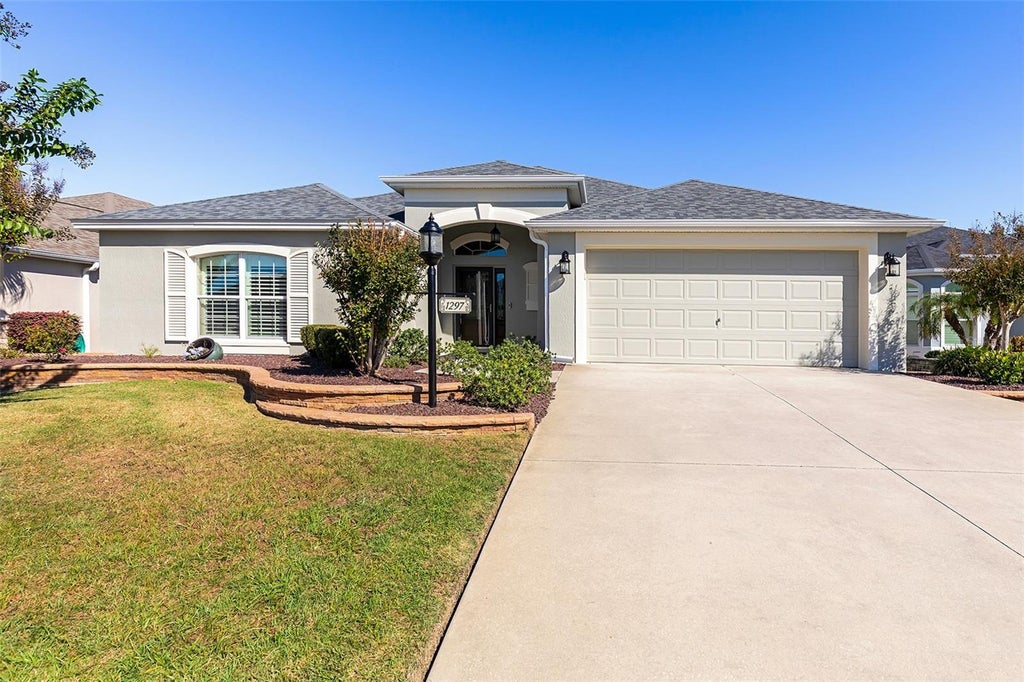 Photo of 1297 Zombar Pl, The Villages, FL 32163 (MLS # O6450552)