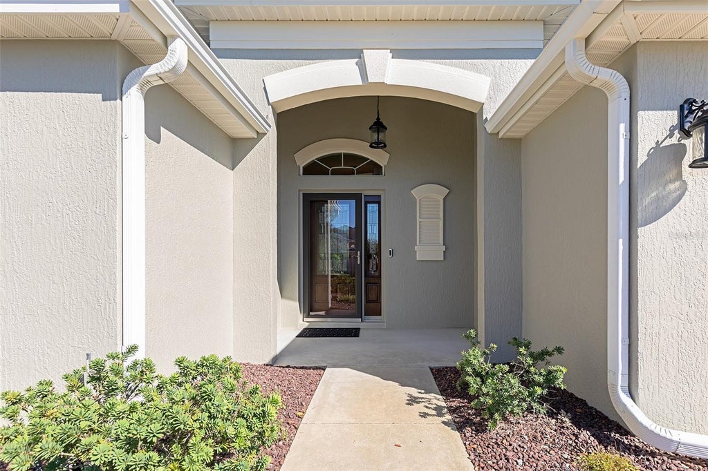 Photo of 1297 Zombar Pl, The Villages, FL 32163 (MLS # O6450552)
