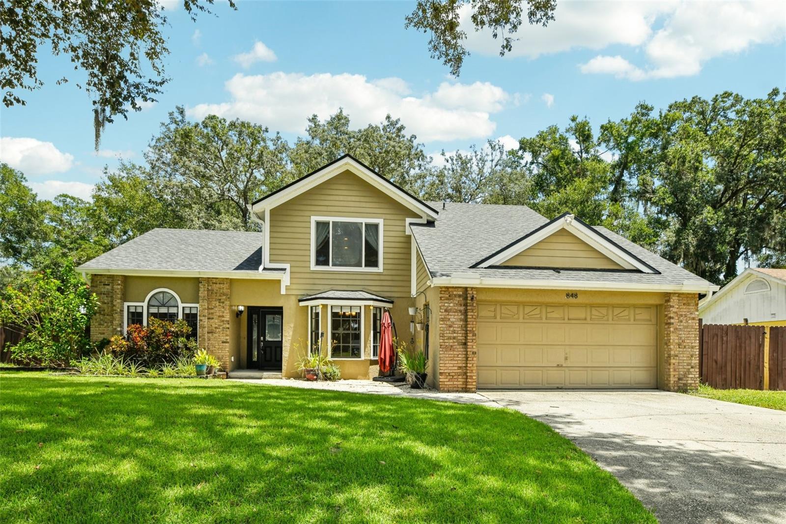 Tucked away in the peaceful Hidden Oaks community of Longwood, this beautifully cared-for 4-bedroom, 2.5-bath home is a private retreat on a quiet, tree-lined cul-de-sac with no through traffic. Sitting on nearly ¼ acre, the property offers exceptional privacy, curb appeal, and room to relax. This lovely home features two master bedrooms, with one on the first floor! Inside, you’ll find an updated kitchen, elegant wood flooring upstairs, and recent upgrades throughout — including new plumbing, a water heater (August 2022), a new AC unit (2024), and a new roof (April 2022), giving you peace of mind for years to come. The spacious backyard is ideal for entertaining, complete with an RV gate and a recently added 12-foot swim spa — perfect for unwinding at the end of the day. Don’t miss your chance to own this Hidden Oaks gem! Request a showing today!