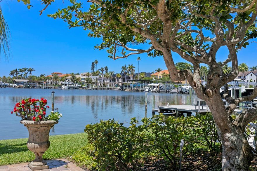 **Iconic Waterfront Estate on Brightwaters Blvd on an Oversized lot with Direct Access to the Open Bay** Welcome to 321 Brightwaters Blvd NE, a rare and expansive waterfront estate in the heart of Snell Isle. Set on a 0.41-acre oversized lot with 140 feet of water frontage, this one-of-a-kind property offers an unmatched blend of sophistication, luxury, and downtown convenience. Boaters will appreciate the direct, bridge-free access to open Tampa Bay waters—ideal for sailboats and larger vessels alike. The residence is a thoughtfully preserved architectural treasure with intricate details inspired by Venetian palazzos. Originally designed by the esteemed S.V. Schooley, architect for C. Perry Snell, and constructed with terra cotta block for exceptional longevity, this Mediterranean Revival masterpiece blends timeless design with modern comfort across more than 5,300 square feet of elegant living space. The property is gated and fenced, providing additional privacy and tranquility. Rich in character with spectacular water views, the home features soaring arched windows and passageways, intricate hand-painted Italian-inspired accents, and three fireplaces that add warmth and ambiance throughout. It has been updated with hurricane impact windows and doors, combining classic craftsmanship with peace-of-mind resilience. The main home features four spacious bedrooms and four full baths, an attached one-car garage, and a separate two-car garage with a full bath and dedicated exercise space—offering the perfect blend of comfort for daily living and versatility for grand-scale entertaining. The sparkling waterfront pool is a breathtaking centerpiece, reminiscent of the Italian Riviera, with lush tropical landscaping, expansive entertaining decks, and a deep-water dock with a boat lift creating a serene escape. Whether you're lounging poolside enjoying the sunset or entertaining guests under the open sky, the setting evokes the romance and relaxed luxury of a seaside villa. Located just minutes from vibrant downtown St. Petersburg, the Vinoy Golf Club, waterfront parks, art galleries, and world-class dining, this is more than a home—this is a legacy estate!