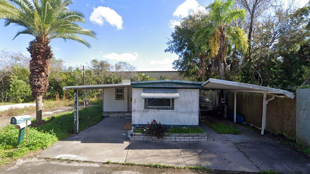 PRICE REDUCTION! Own the land! Ths mobile home is in an excellent location walking distance to the bustling and exciting New Port Richey Main Street. Surrounded by shops, bars, restaurants, schools and more.This home was recently flooded and needs to be completely remodeled. The home can be 3 bedrooms with 1.5 bathrooms and includes a car port.The sale includes sealed engineering plans for all of the work necessary and to obtain permits. A $3500 value.You can also demo the home and replace it with a new mobile home. Fetching $1400 to $1600 a month in rents will provide a great return, don't miss this opportunity.