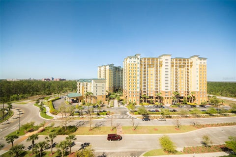 Photo of 8112 Poinciana Boulevard #1802, Orlando, FL 32821 (MLS # O6425892)