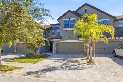 Photo of 4868 Wandering Way, Wesley Chapel, FL 33544 (MLS # TB8560792)