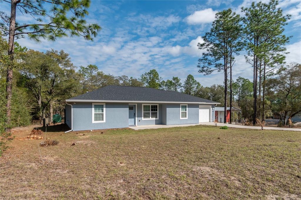 Photo of 20687 SW 59th Lane, Dunnellon, FL 34431 (MLS # OM718696)