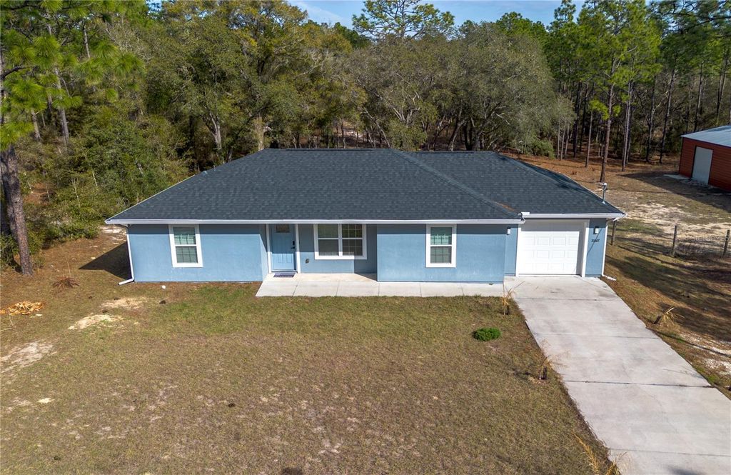 Photo of 20687 SW 59th Lane, Dunnellon, FL 34431 (MLS # OM718696)