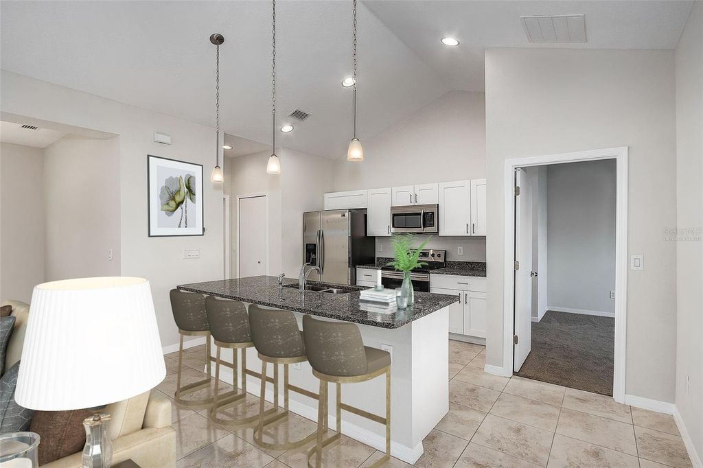 Photo of 719 Haleybury Street, Port Charlotte, FL 33948 (MLS # C7518725)