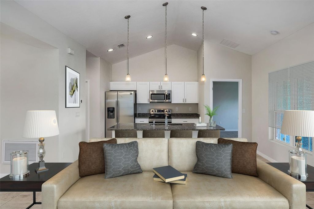 Photo of 719 Haleybury Street, Port Charlotte, FL 33948 (MLS # C7518725)