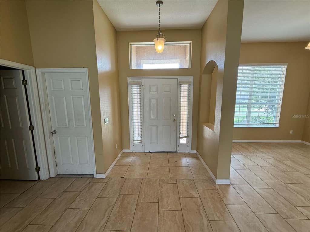 Photo of 7101 White Trillium Circle, Orlando, FL 32818 (MLS # O6432460)