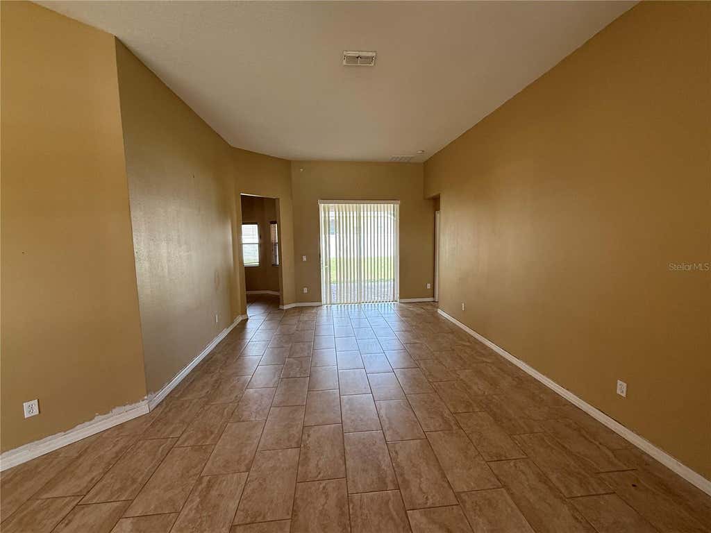 Photo of 7101 White Trillium Circle, Orlando, FL 32818 (MLS # O6432460)