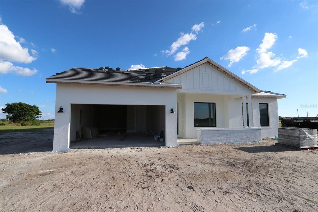 Photo of 17527 Foxtail Loop, Venice, FL 34293 (MLS # TB8420094)