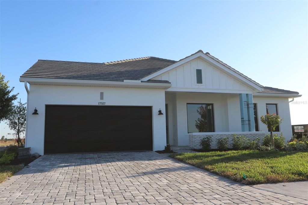 Photo of 17527 Foxtail Loop, Venice, FL 34293 (MLS # TB8420094)