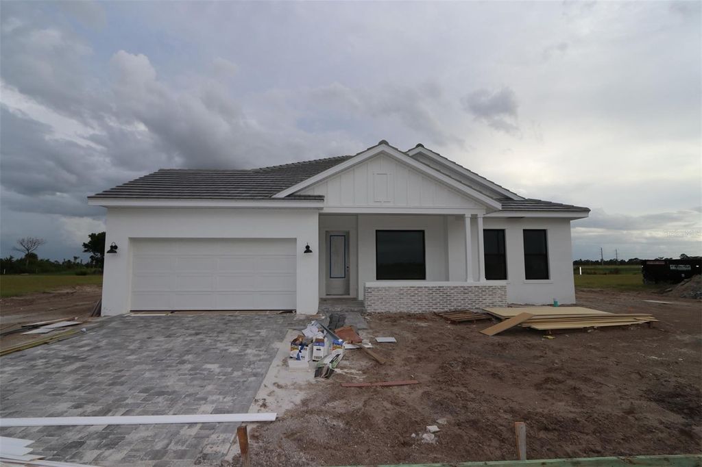 Photo of 17527 Foxtail Loop, Venice, FL 34293 (MLS # TB8420094)